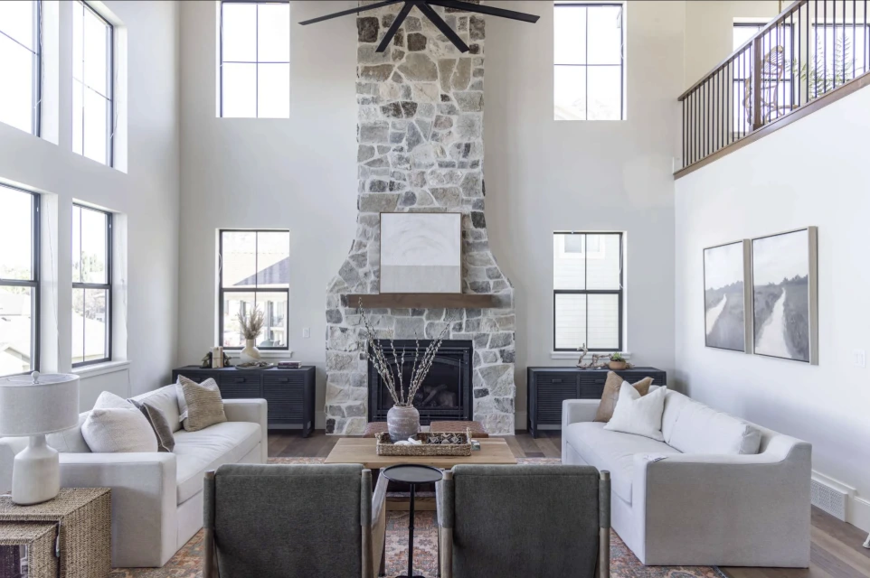Stone Fireplace in a elevated living room opposing sofas