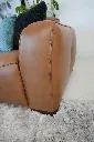 Samsara-leather-reclining-sectional-modular-drop-arm.webp