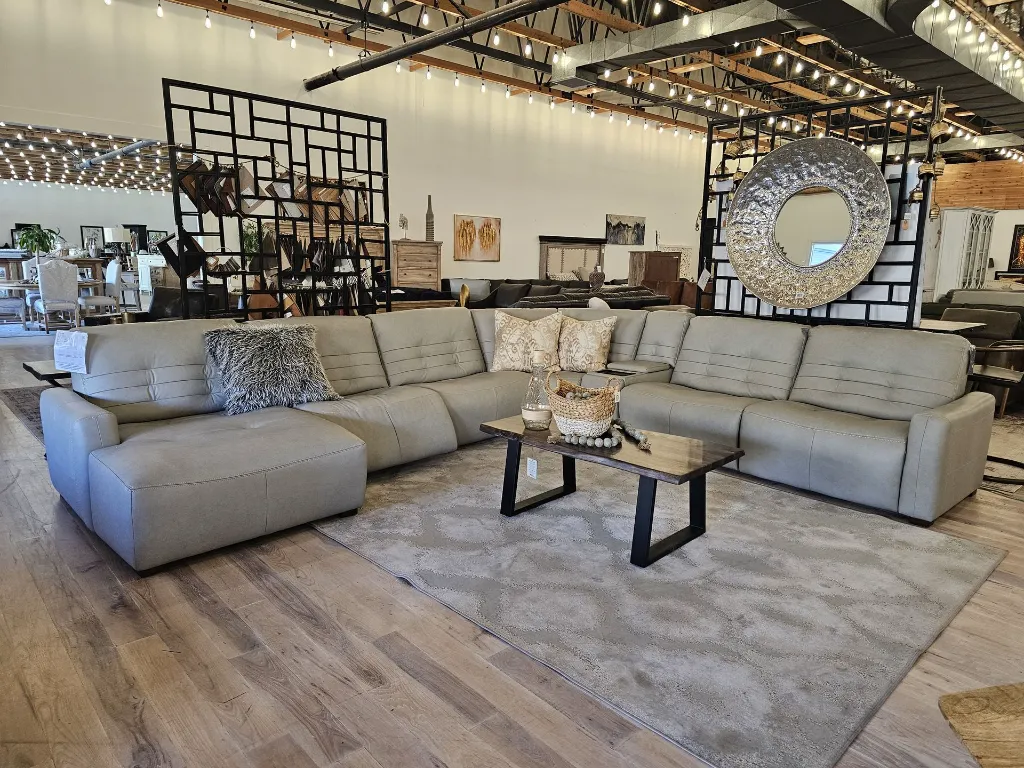 Marina sectional leather reclining showroom shot.webp