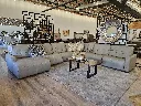 Marina sectional leather reclining showroom shot.webp