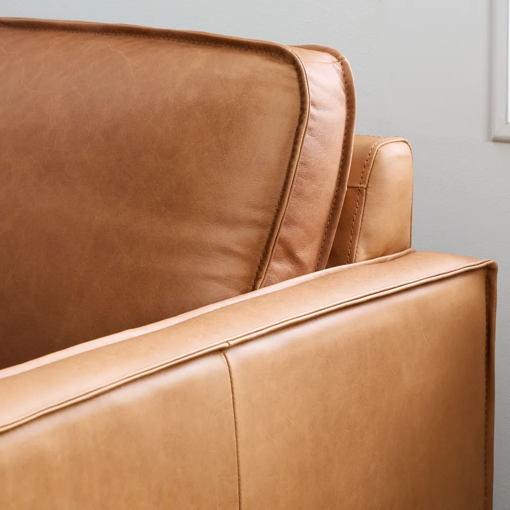 Wells-leather-back-detail-sofa-love-chair.webp