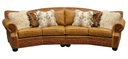 Cartwright-leather-conversation-sofa-fur-pillows.jpg
